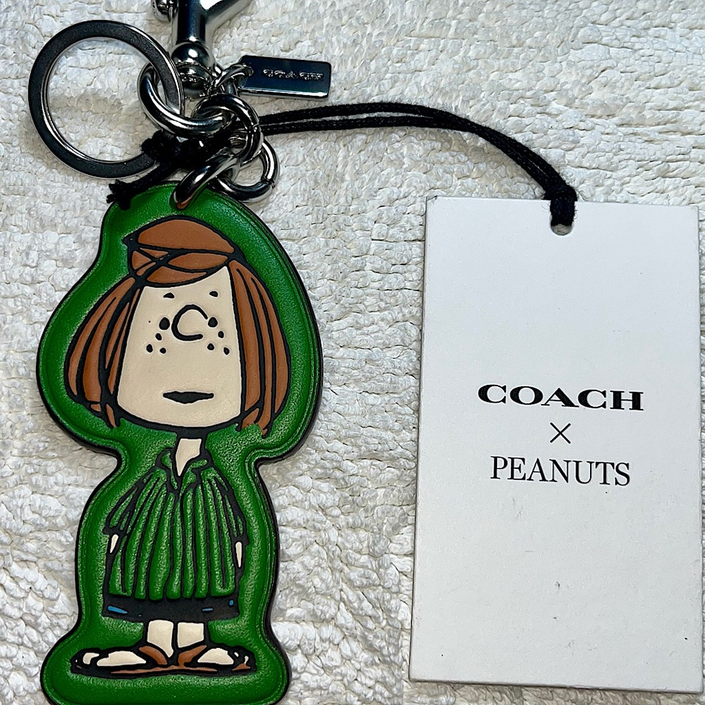 Coach x Collection Item and Original!
Peanuts Peppermint Patty Bag Charm.